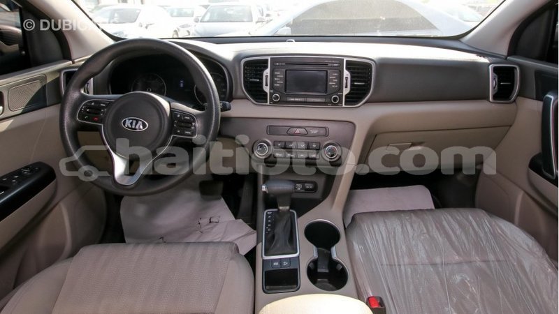 Big with watermark kia sportage artibonite import dubai 1322