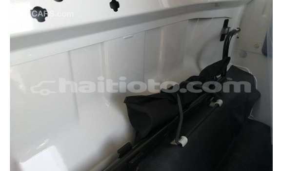 Buy Import Mitsubishi Carisma White Car in Import - Dubai in Artibonite Buy Import Mitsubishi Carisma White Car in Import - Dubai in Artibonite