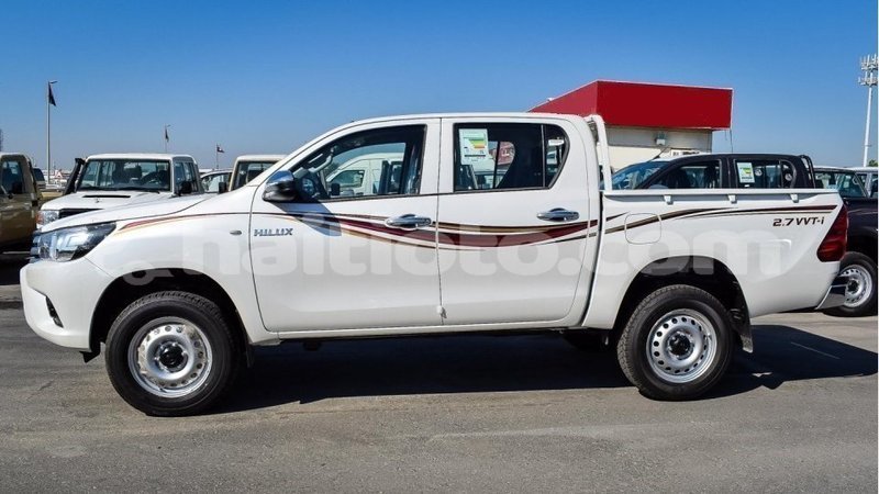 Big with watermark toyota hilux artibonite import dubai 1744