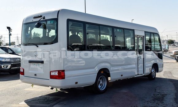 Acheter Import Voiture Toyota Coaster Blanc à Import - Dubai, Artibonite Acheter Import Voiture Toyota Coaster Blanc à Import - Dubai, Artibonite