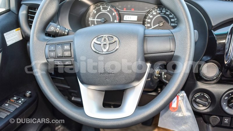Big with watermark toyota hilux artibonite import dubai 1793