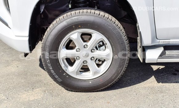 Acheter Import Voiture Mitsubishi L200 Blanc à Import - Dubai, Artibonite Acheter Import Voiture Mitsubishi L200 Blanc à Import - Dubai, Artibonite