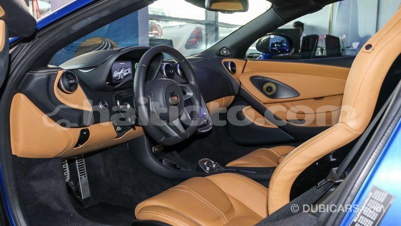 Big with watermark mclaren 570s artibonite import dubai 1805