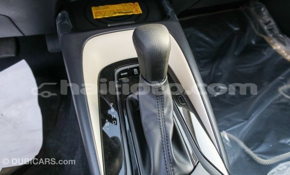 Acheter Import Voiture Toyota Corolla Blanc à Import - Dubai, Artibonite Acheter Import Voiture Toyota Corolla Blanc à Import - Dubai, Artibonite