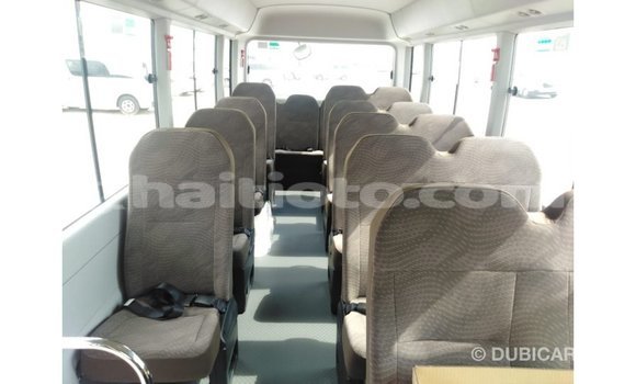 Acheter Import Voiture Toyota Coaster Blanc à Import - Dubai, Artibonite Acheter Import Voiture Toyota Coaster Blanc à Import - Dubai, Artibonite