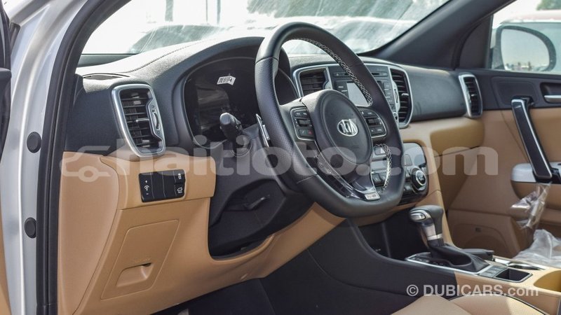 Big with watermark kia sportage artibonite import dubai 1906