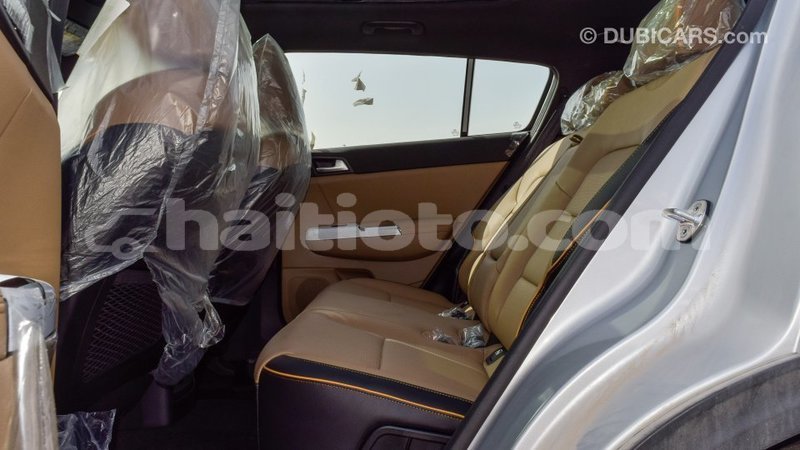 Big with watermark kia sportage artibonite import dubai 1906