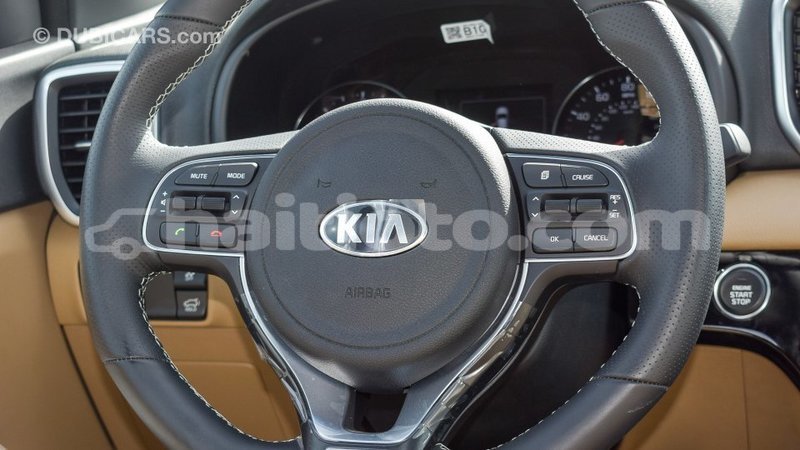 Big with watermark kia sportage artibonite import dubai 1906