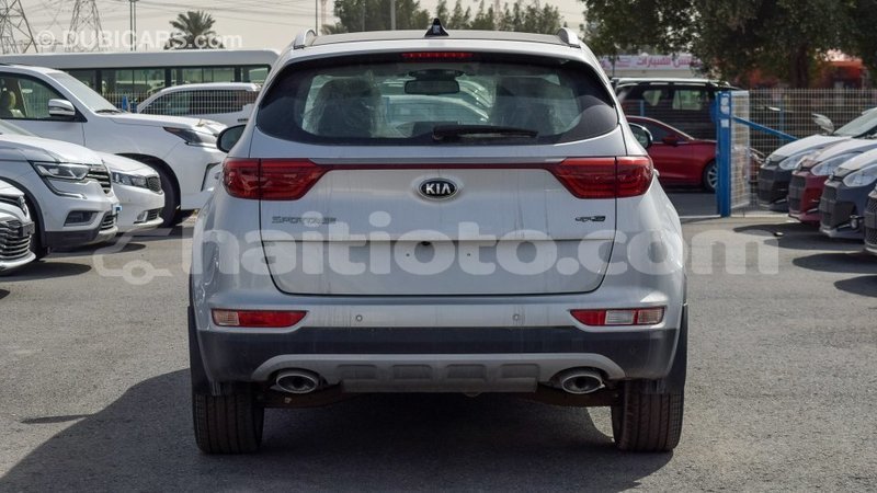 Big with watermark kia sportage artibonite import dubai 1906