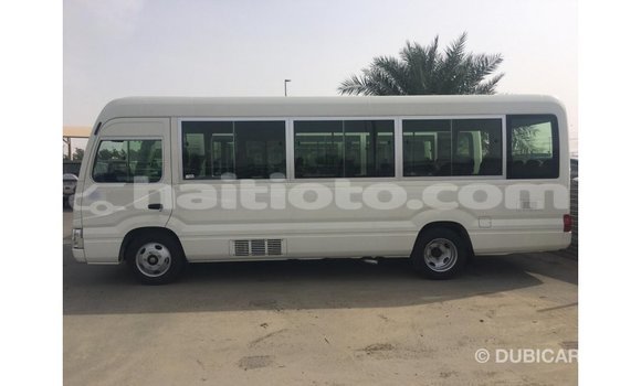 Acheter Import Voiture Toyota Coaster Blanc à Import - Dubai, Artibonite Acheter Import Voiture Toyota Coaster Blanc à Import - Dubai, Artibonite
