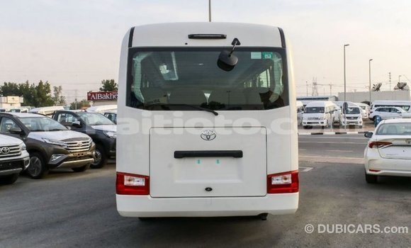 Acheter Import Voiture Toyota Coaster Blanc à Import - Dubai, Artibonite Acheter Import Voiture Toyota Coaster Blanc à Import - Dubai, Artibonite