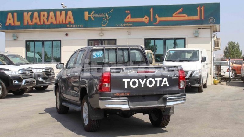 Big with watermark toyota hilux artibonite import dubai 2007