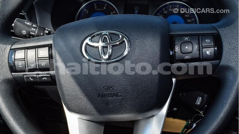 Big with watermark toyota hilux artibonite import dubai 2008