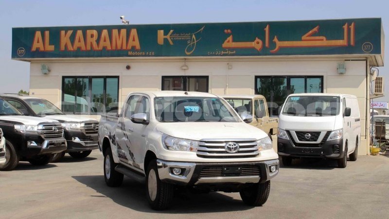 Big with watermark toyota hilux artibonite import dubai 2040