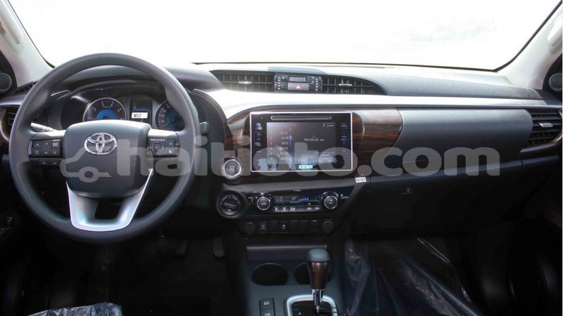 Big with watermark toyota hilux artibonite import dubai 2043