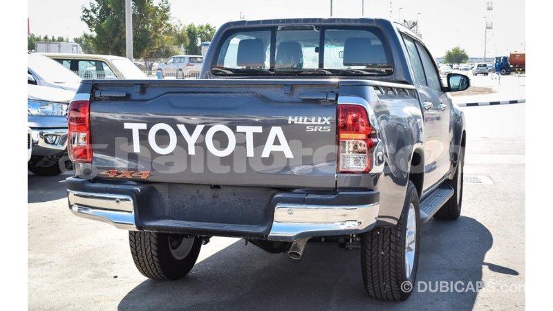 Big with watermark toyota hilux artibonite import dubai 2045
