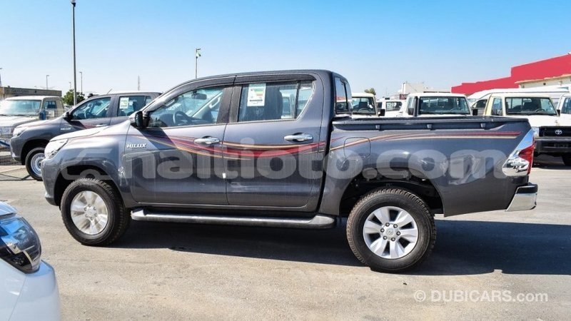 Big with watermark toyota hilux artibonite import dubai 2045