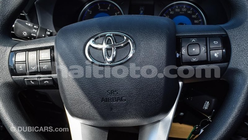 Big with watermark toyota hilux artibonite import dubai 2045