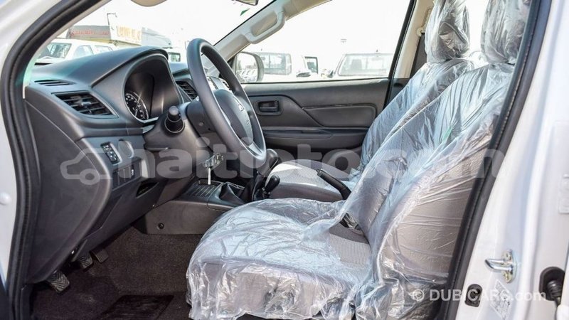 Big with watermark mitsubishi l200 artibonite import dubai 2446
