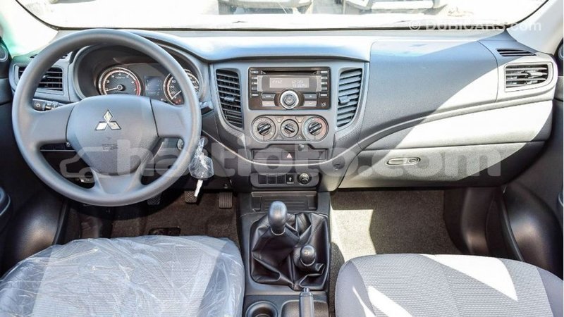 Big with watermark mitsubishi l200 artibonite import dubai 2446