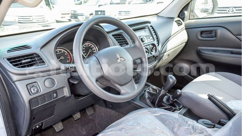 Big with watermark mitsubishi l200 artibonite import dubai 2446