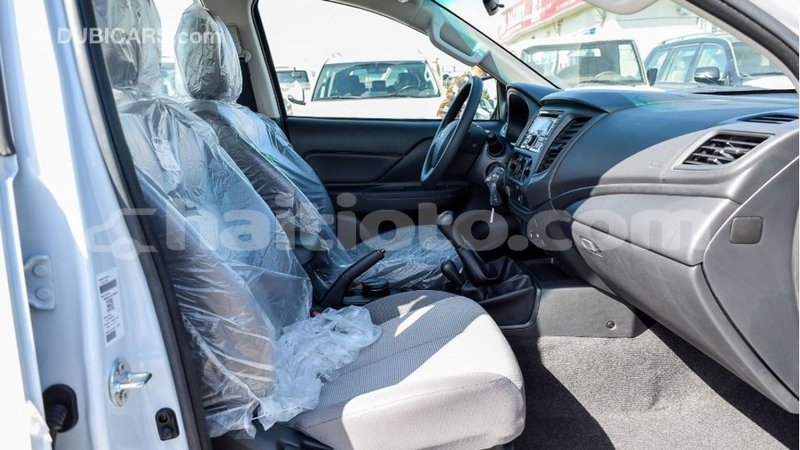 Big with watermark mitsubishi l200 artibonite import dubai 2446