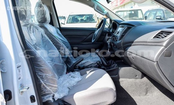 Acheter Import Voiture Mitsubishi L200 Blanc à Import - Dubai, Artibonite Acheter Import Voiture Mitsubishi L200 Blanc à Import - Dubai, Artibonite