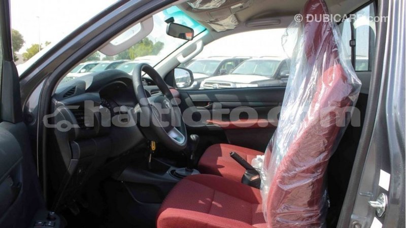 Big with watermark toyota hilux artibonite import dubai 2469