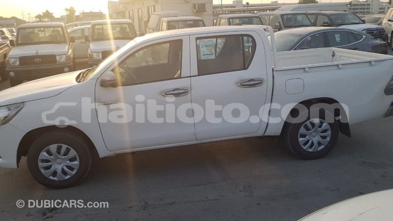 Big with watermark toyota hilux artibonite import dubai 2499