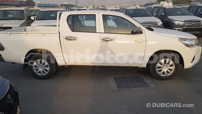 Big with watermark toyota hilux artibonite import dubai 2499