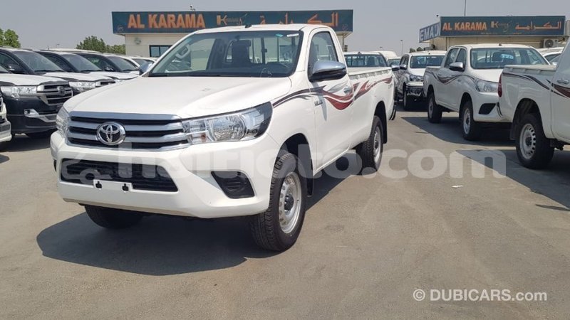 Big with watermark toyota hilux artibonite import dubai 2502