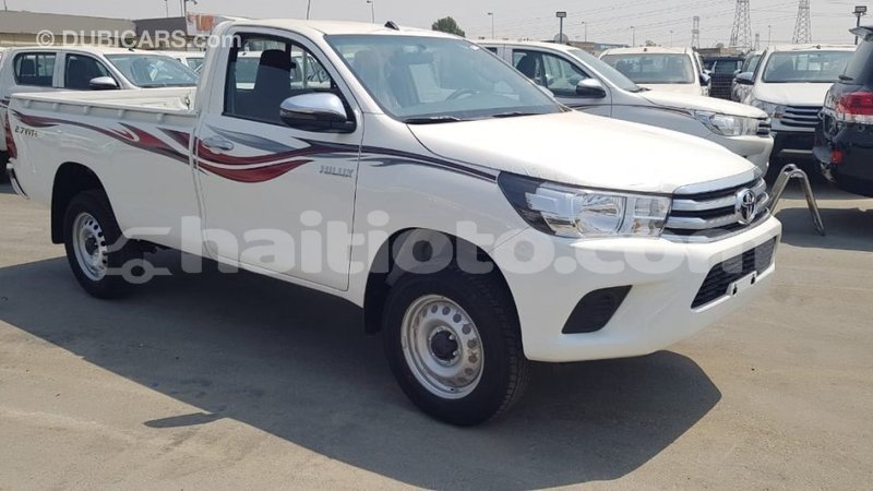Big with watermark toyota hilux artibonite import dubai 2502