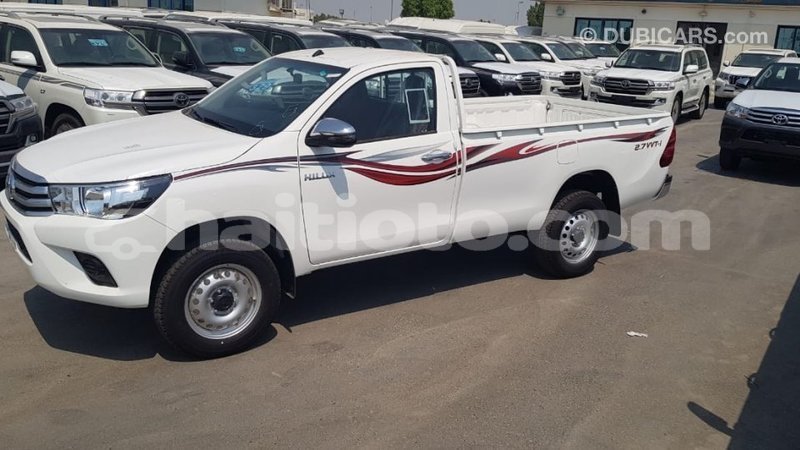 Big with watermark toyota hilux artibonite import dubai 2502