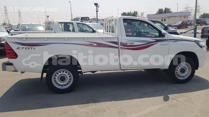 Big with watermark toyota hilux artibonite import dubai 2502