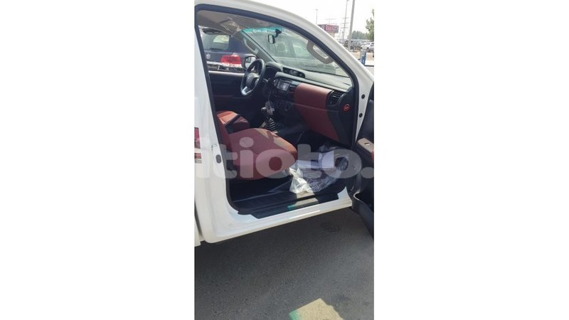 Big with watermark toyota hilux artibonite import dubai 2502