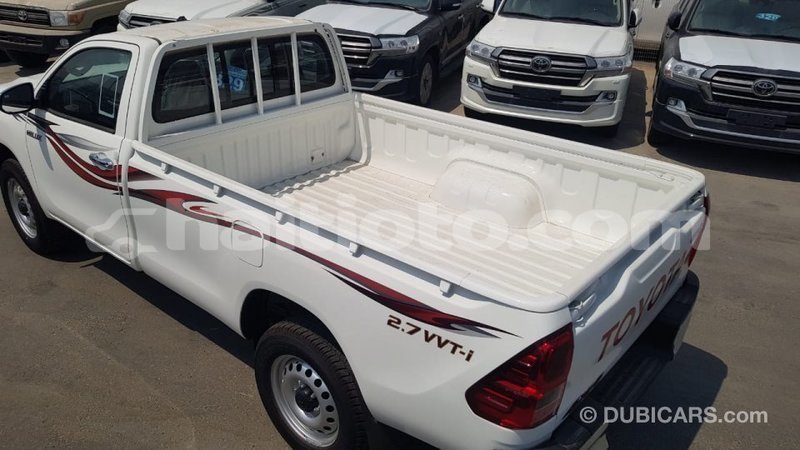 Big with watermark toyota hilux artibonite import dubai 2502