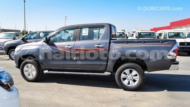 Big with watermark toyota hilux artibonite import dubai 2509