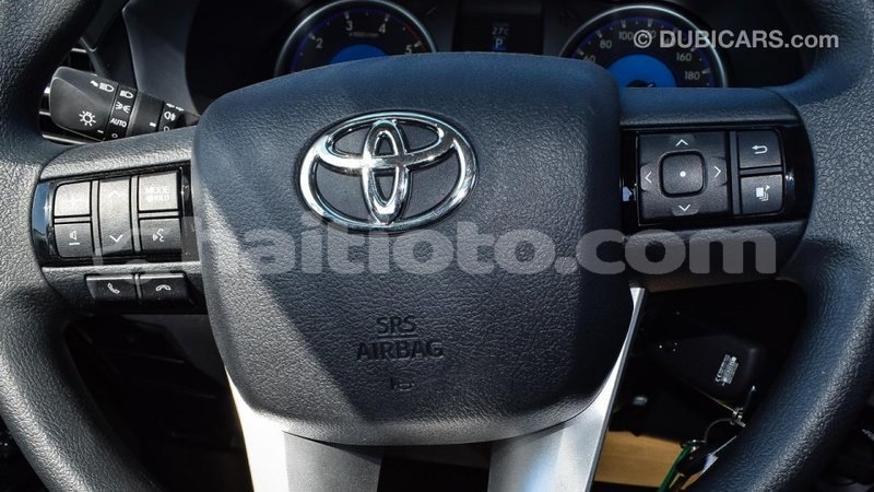 Big with watermark toyota hilux artibonite import dubai 2511