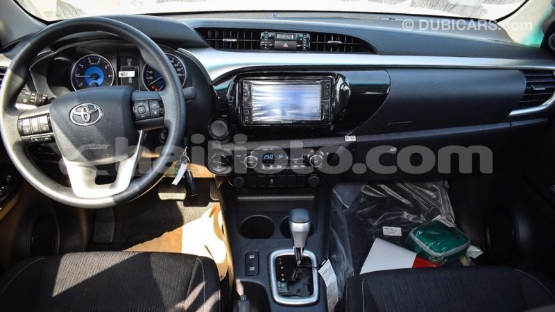 Big with watermark toyota hilux artibonite import dubai 2511