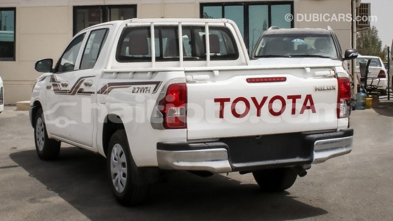 Big with watermark toyota hilux artibonite import dubai 2512