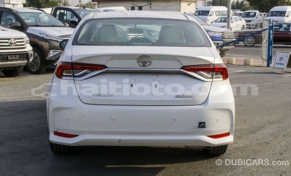 Acheter Import Voiture Toyota Corolla Blanc à Import - Dubai, Artibonite Acheter Import Voiture Toyota Corolla Blanc à Import - Dubai, Artibonite