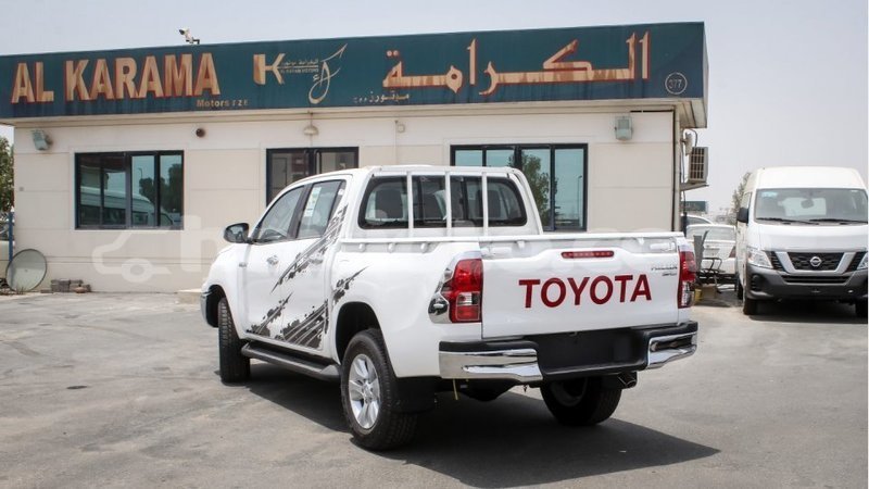 Big with watermark toyota hilux artibonite import dubai 2593