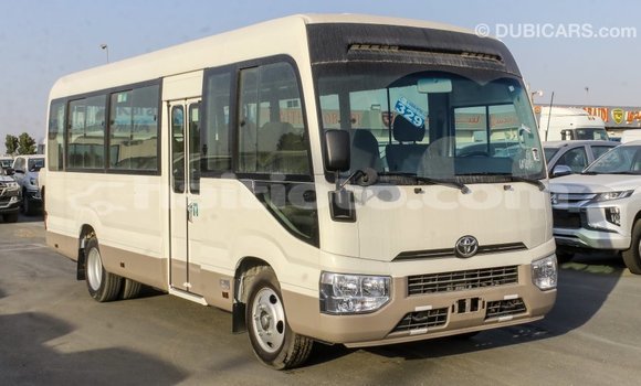 Acheter Import Voiture Toyota Coaster Blanc à Import - Dubai, Artibonite Acheter Import Voiture Toyota Coaster Blanc à Import - Dubai, Artibonite