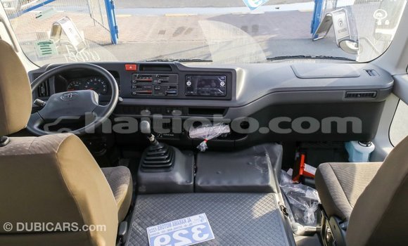 Acheter Import Voiture Toyota Coaster Blanc à Import - Dubai, Artibonite Acheter Import Voiture Toyota Coaster Blanc à Import - Dubai, Artibonite