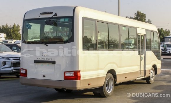 Acheter Import Voiture Toyota Coaster Blanc à Import - Dubai, Artibonite Acheter Import Voiture Toyota Coaster Blanc à Import - Dubai, Artibonite