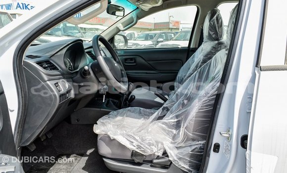 Acheter Import Voiture Mitsubishi L200 Blanc à Import - Dubai, Artibonite Acheter Import Voiture Mitsubishi L200 Blanc à Import - Dubai, Artibonite