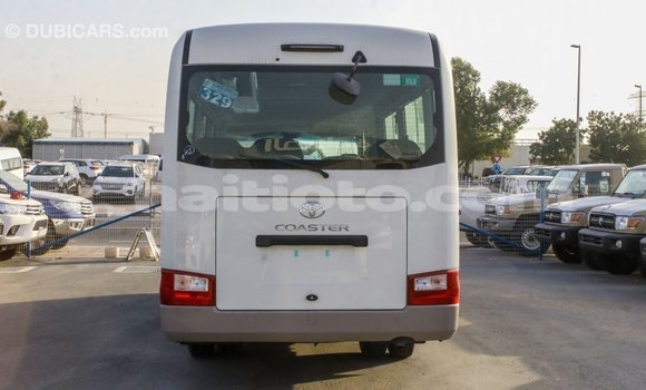 Acheter Import Voiture Toyota Coaster Blanc à Import - Dubai, Artibonite Acheter Import Voiture Toyota Coaster Blanc à Import - Dubai, Artibonite