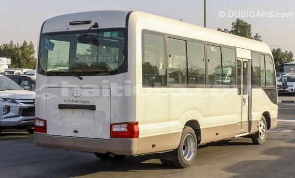 Acheter Import Voiture Toyota Coaster Blanc à Import - Dubai, Artibonite Acheter Import Voiture Toyota Coaster Blanc à Import - Dubai, Artibonite