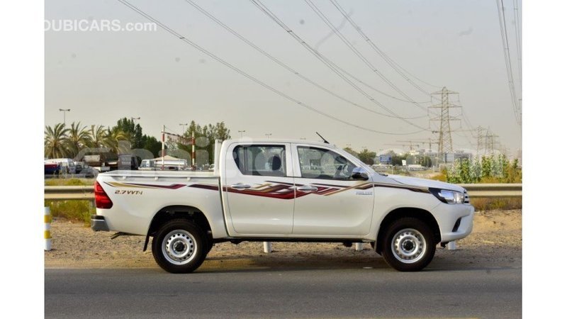Big with watermark toyota hilux artibonite import dubai 2987
