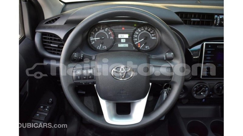 Big with watermark toyota hilux artibonite import dubai 2987